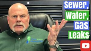 Professional plumber explaining how plumbers locate water leaks, sewer leaks, and gas leaks using specialized leak detection methods