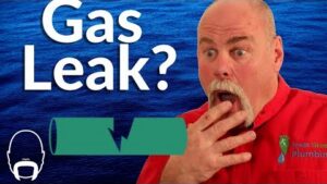 Professional plumber explaining how to find a gas leak beneath a house using safe gas leak detection methods and specialized equipment
